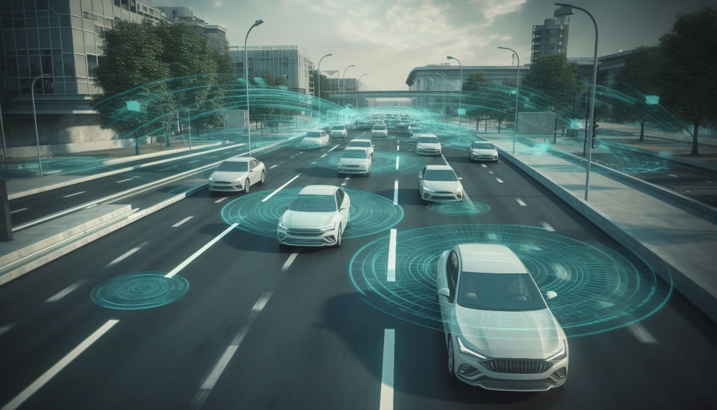 A group of cars driving on a road.