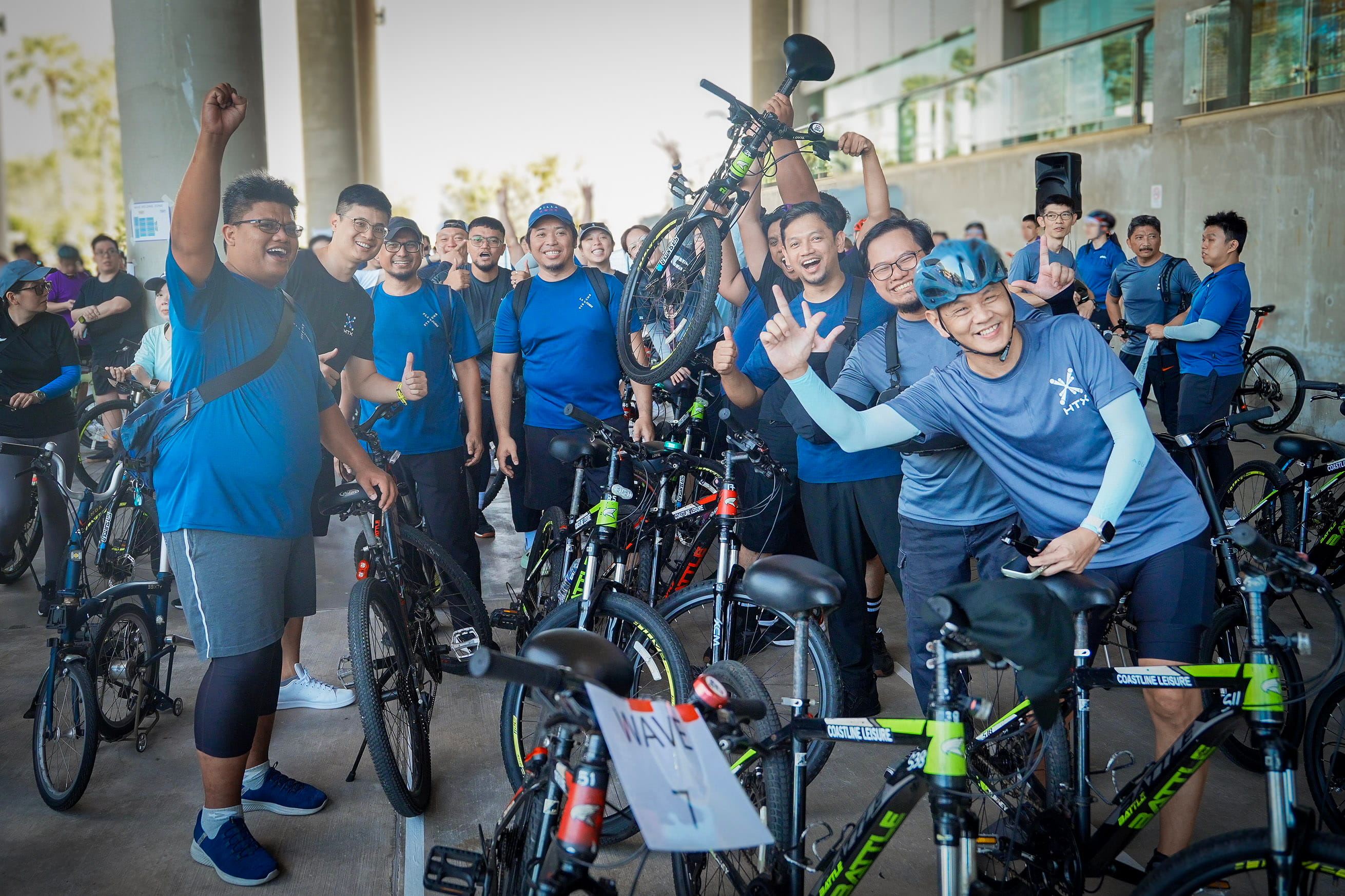 Group of people with bikes.