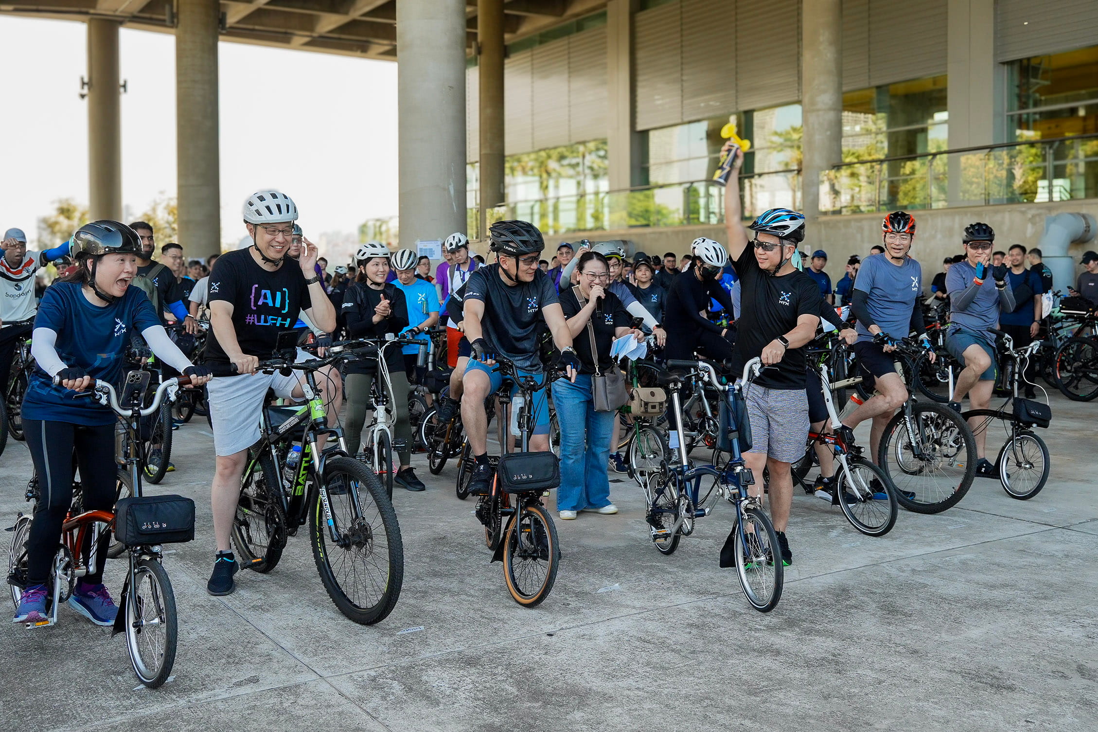 Group of people with bikes.